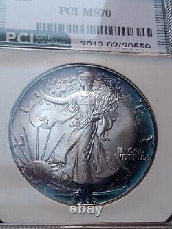 1986 (S) American $1 Silver Eagle 1 oz. Fine 999 BLUE and PURPLE TONED KEY DATE