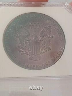 1986 (S) American $1 Silver Eagle 1 oz. Fine 999 BLUE and PURPLE TONED KEY DATE