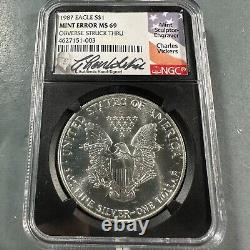 1987 Silver Eagle NGC MS69, Vickers Sig. MINT ERROR, Obv Struck Thru (82397)