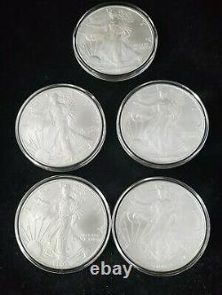 2007 -5 count 1 oz. 999 Silver-American Silver Eagles in Capsules. BU Bullion$