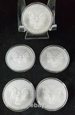 2009 -5 count 1 oz. 999 Silver-American Silver Eagles in Capsules. BU Bullion$