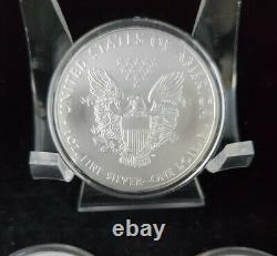 2009 -5 count 1 oz. 999 Silver-American Silver Eagles in Capsules. BU Bullion$