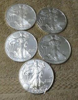 Lot (5) American Silver Eagles Mint Fresh BU. All Different Dates