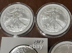 Lot Of 10 Silver Eagles 1oz Coin (5) 2005, (2) 1987, 1989, 1990 1986 With Toning