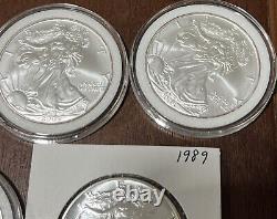 Lot Of 10 Silver Eagles 1oz Coin (5) 2005, (2) 1987, 1989, 1990 1986 With Toning