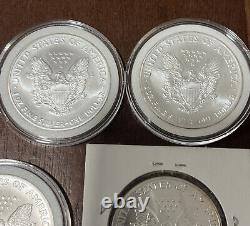 Lot Of 10 Silver Eagles 1oz Coin (5) 2005, (2) 1987, 1989, 1990 1986 With Toning